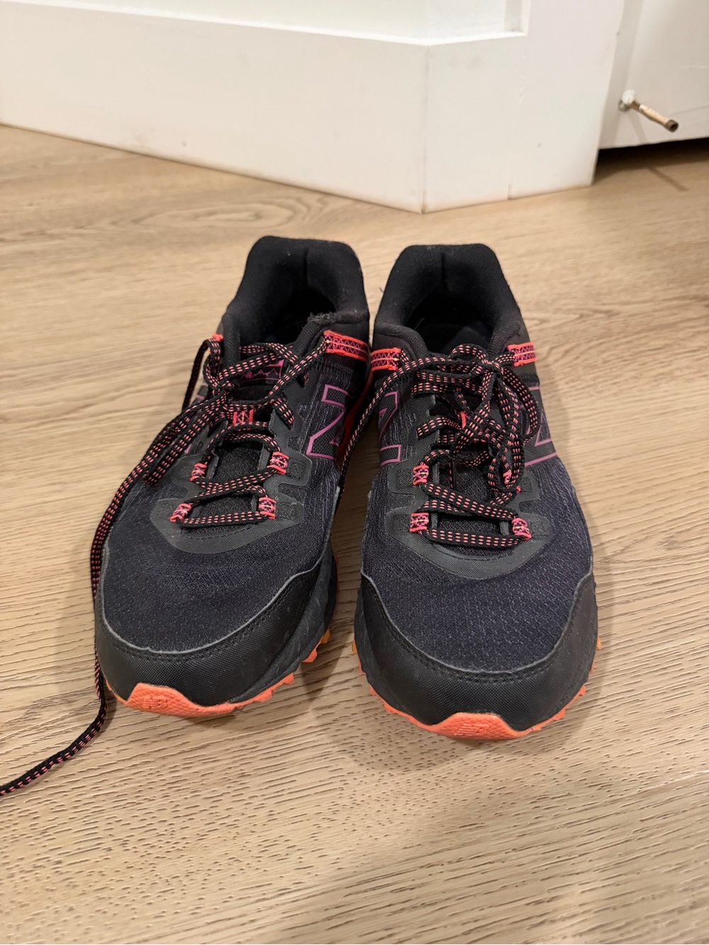 New Balance Kids Black Sneakers with Coral Accents
